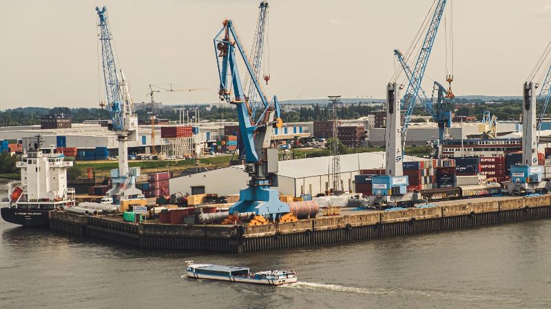 A port with containers and cranes.