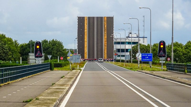 A photo of a bridge. The bridge is opened.