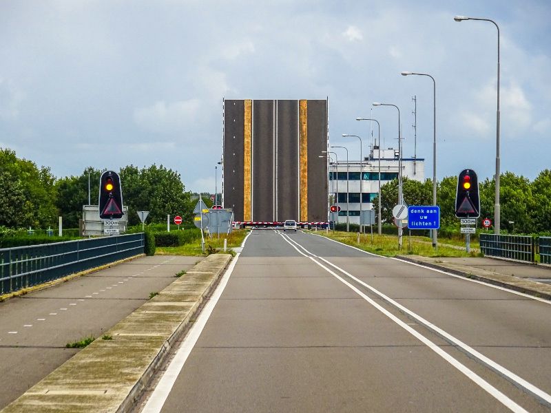 A photo of a bridge. The bridge is opened.