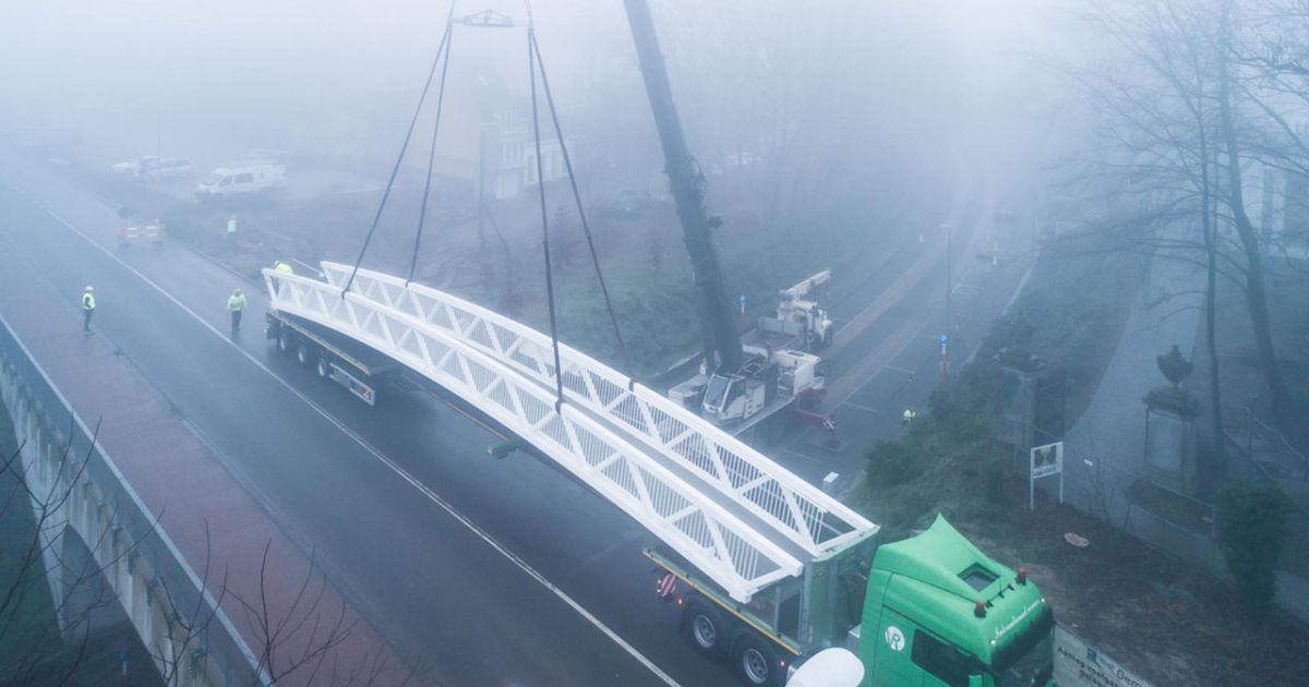 Steel pedestrian bridge connects car park with VITA Scheldebad ...